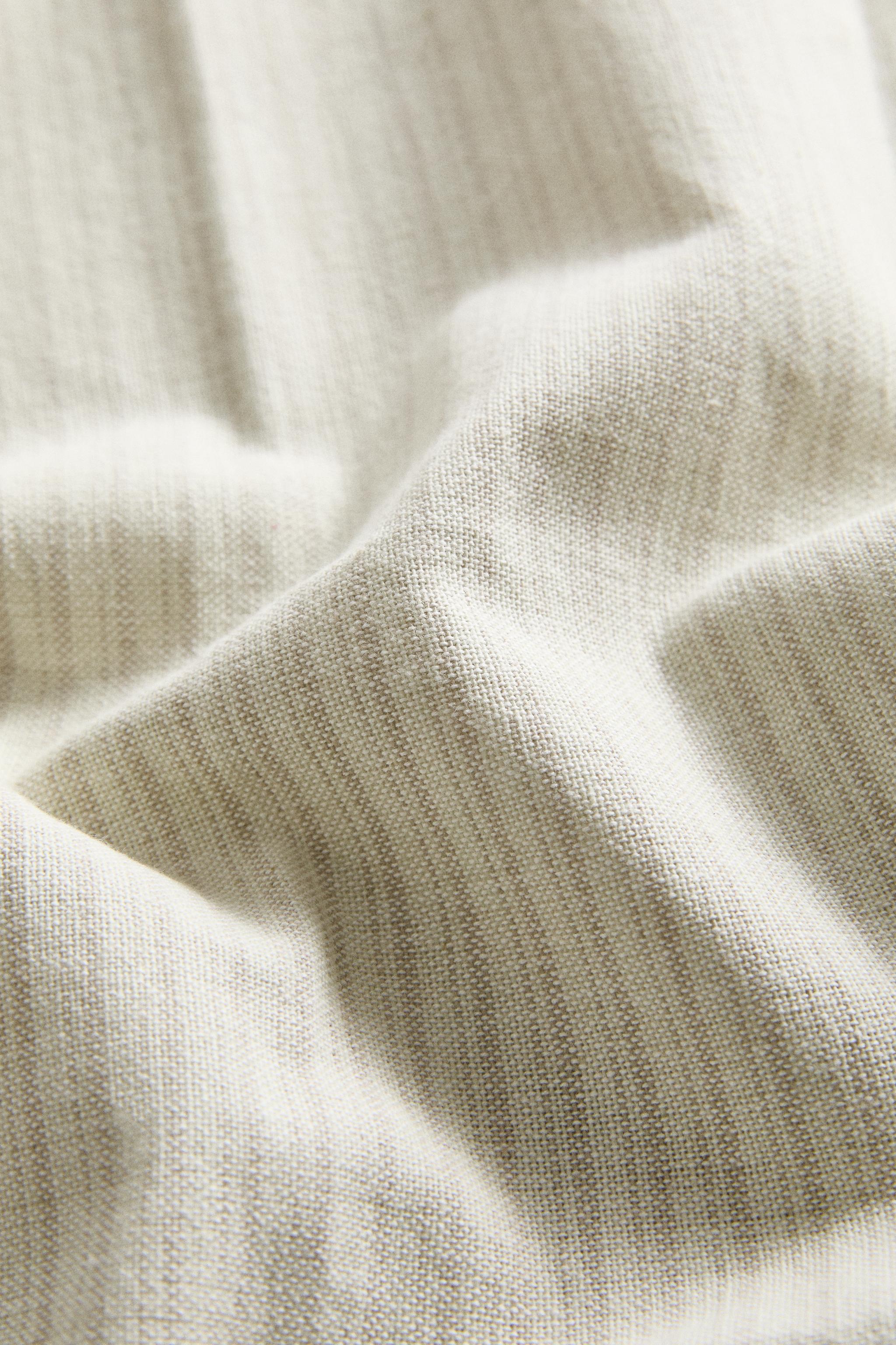 STRIPED OVERLOCK TABLECLOTH